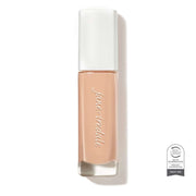 Skintuition SPF30 Radiance Boosting Liquid Foundation 14 Fair 30ml in een elegant, transparant flesje met een lichte tint.
