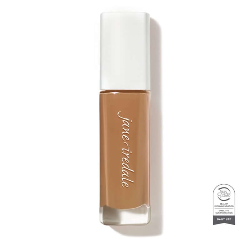 Skintuition SPF30 Radiance Boosting Liquid Foundation 50 Medium Dark 30ml in een lichte fles voor een gezonde huidachtige finish.