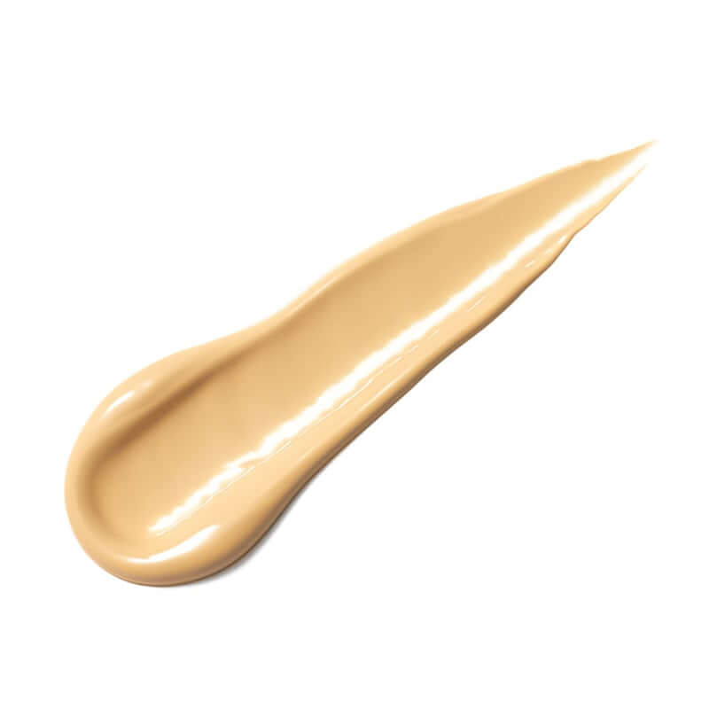 Delilah Take Cover Radiant Cream Concealer Stone 3,5ml in een romige, warme tint op een witte achtergrond.