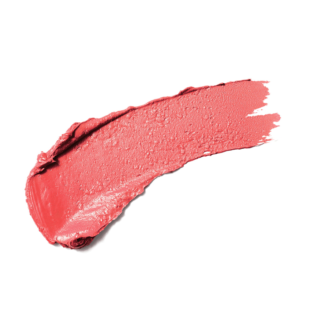 Delilah Colour Intense Cream Lipstick Siren 3,7g - Romige koraalrode lippenstiftstreep met luxe textuur en glans.
