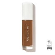 Skintuition SPF30 Radiance Boosting Liquid Foundation 64 Dark 30ml in een stijlvolle glazen verpakking, ideaal voor een stralende huid.