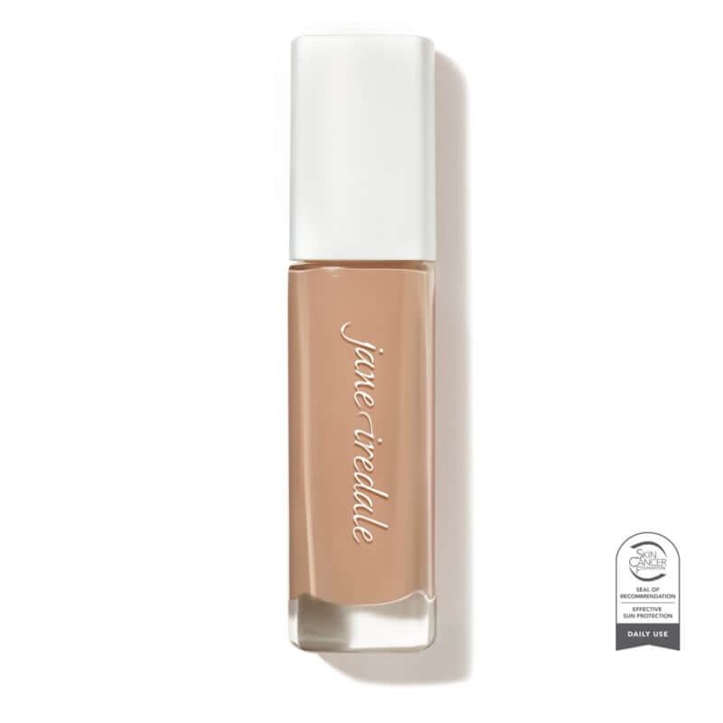 Skintuition SPF30 Radiance Boosting Liquid Foundation 34 Light Medium 30ml in lichtgewicht verpakking voor een stralende huidfinish.