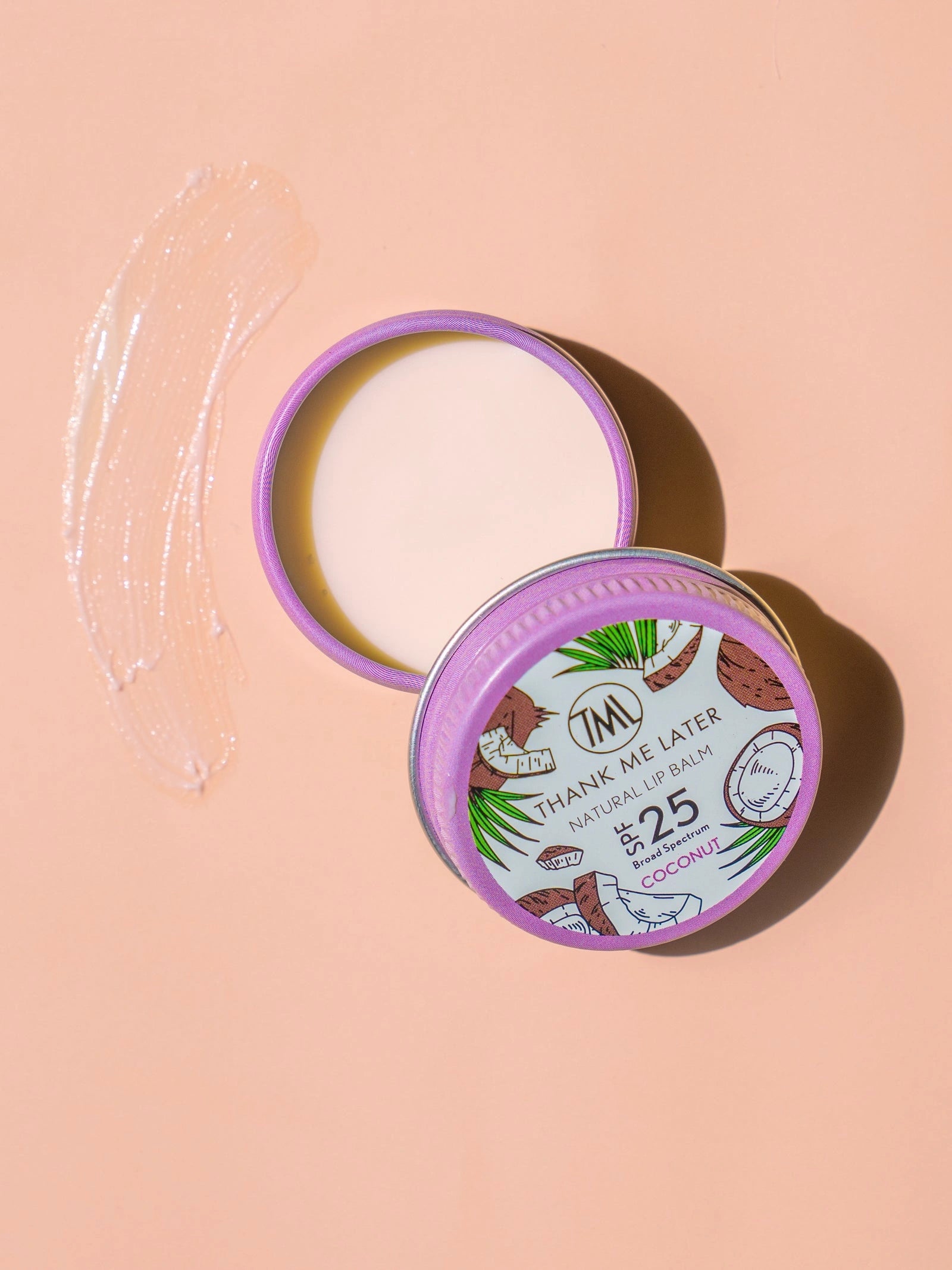 Thank Me Later Natural Lip Balm SPF25 Coconut 10g in open tin with coconut fragrance showing creamy texture.