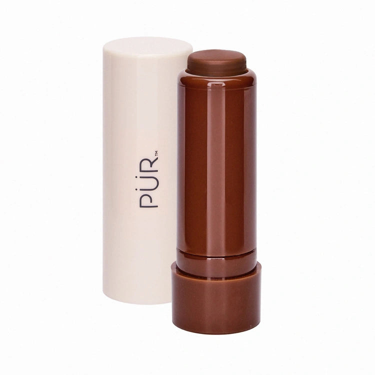 PUR Silky Tint Creamy Multitasking Stick Cocoa Babe 6g met rijke cocoa-tint voor wangen en lippen in stijlvolle verpakking.